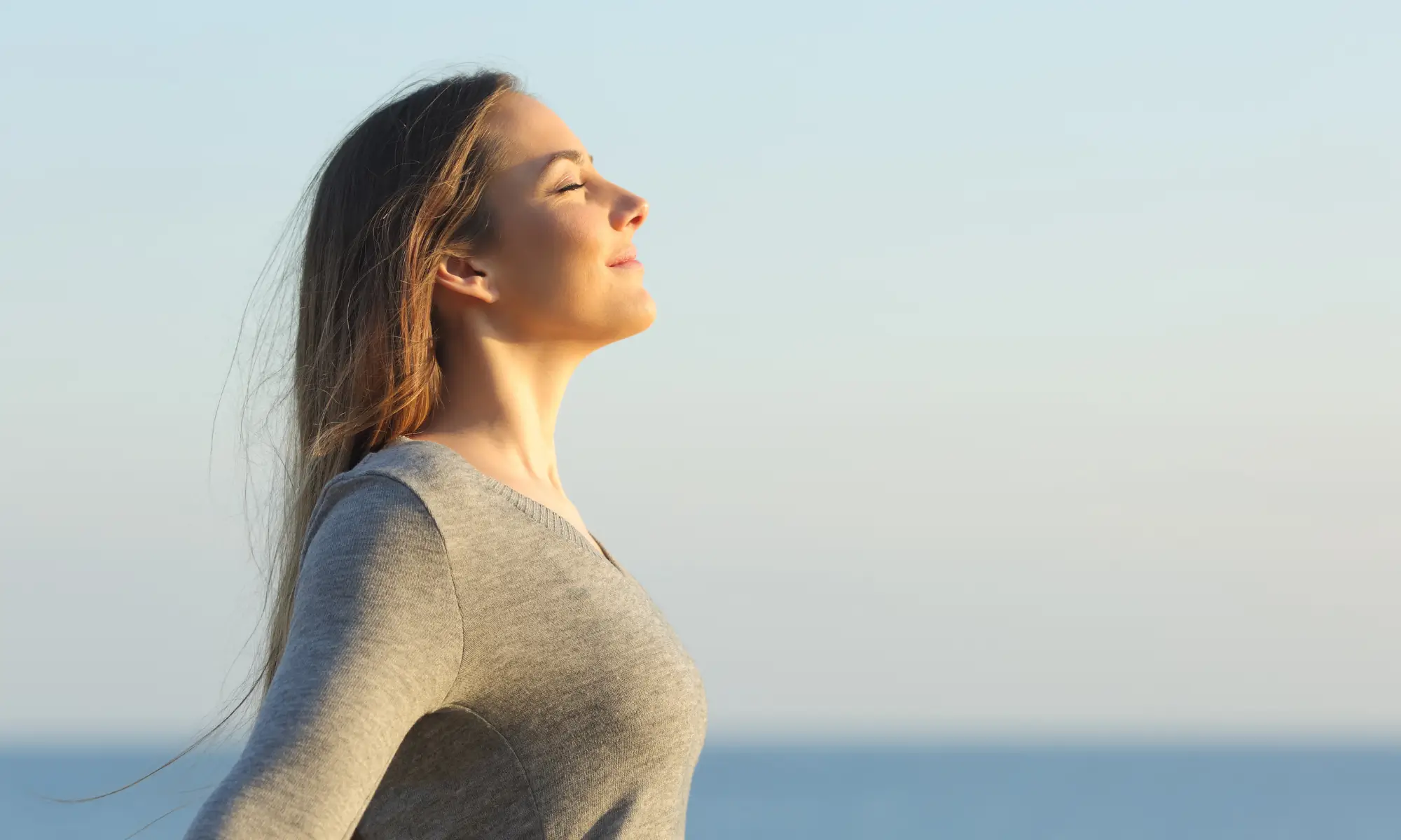 Woman Breathing Clean Air